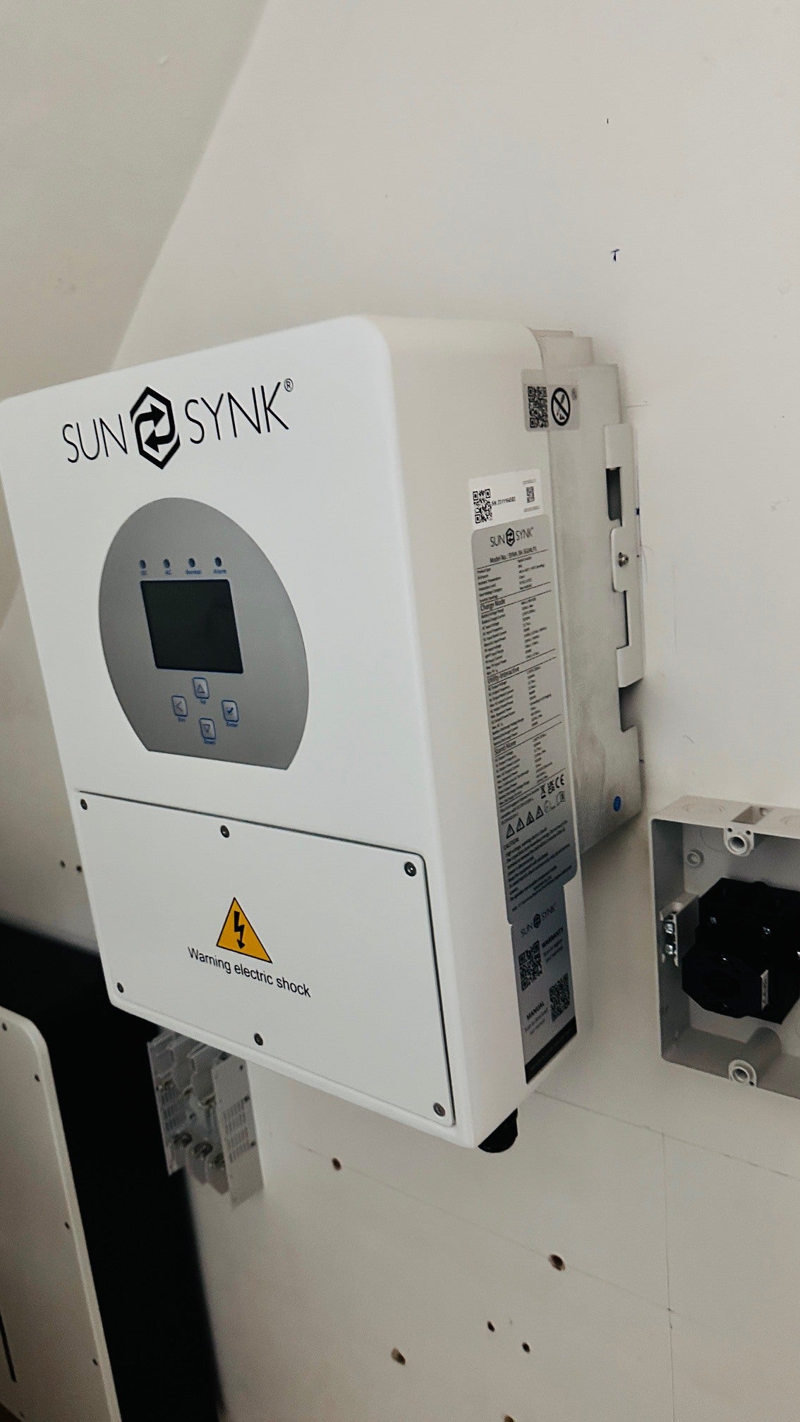 Close-up of Sunsynk 5kw hybrid inverter on wall