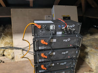 Thumbnail for Stacked Fox HV2600 batteries connected to AC charger