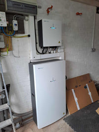 Thumbnail for Side view of Givenergy 6kW AC unit with 13.5kWh battery setup.