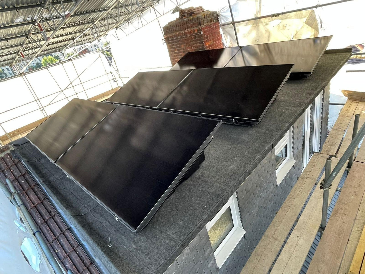 Multiple solar panels on residential roof