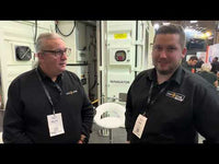 Two technicians discussing Sunsynk inverter setup